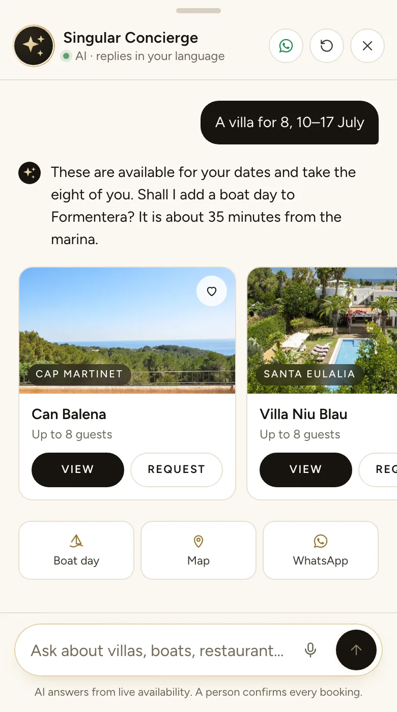 The Singular Concierge on a phone: a villa for eight in July, the houses available for those dates and the offer of a boat day to Formentera.